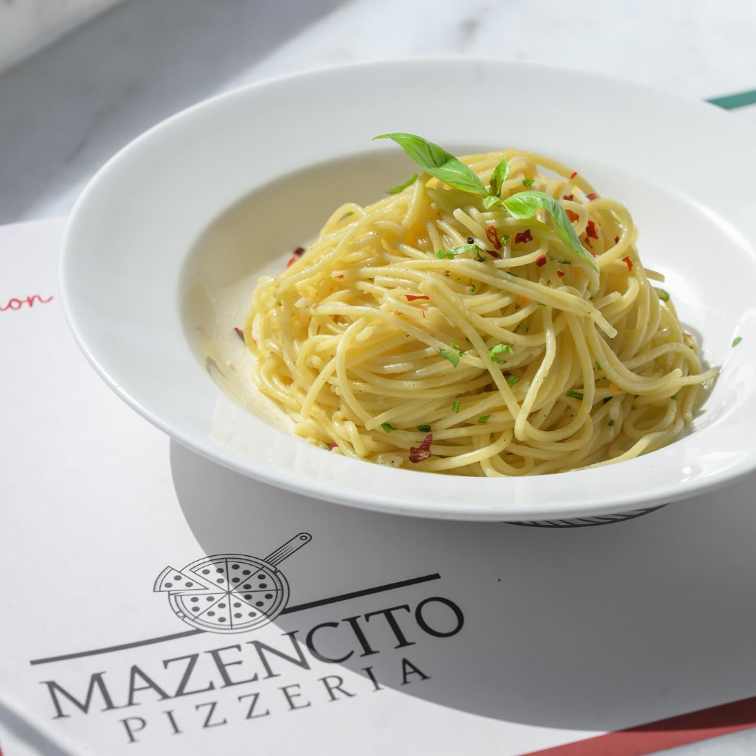 Spaghetti aglio e olio with basil at Mazencito Pizzeria