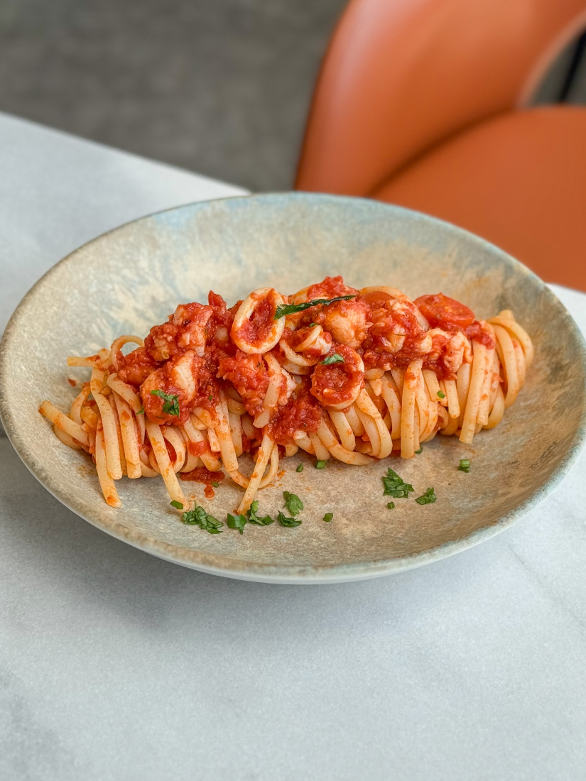 Seafood linguine in tomato sauce at Mazencito Pizzeria