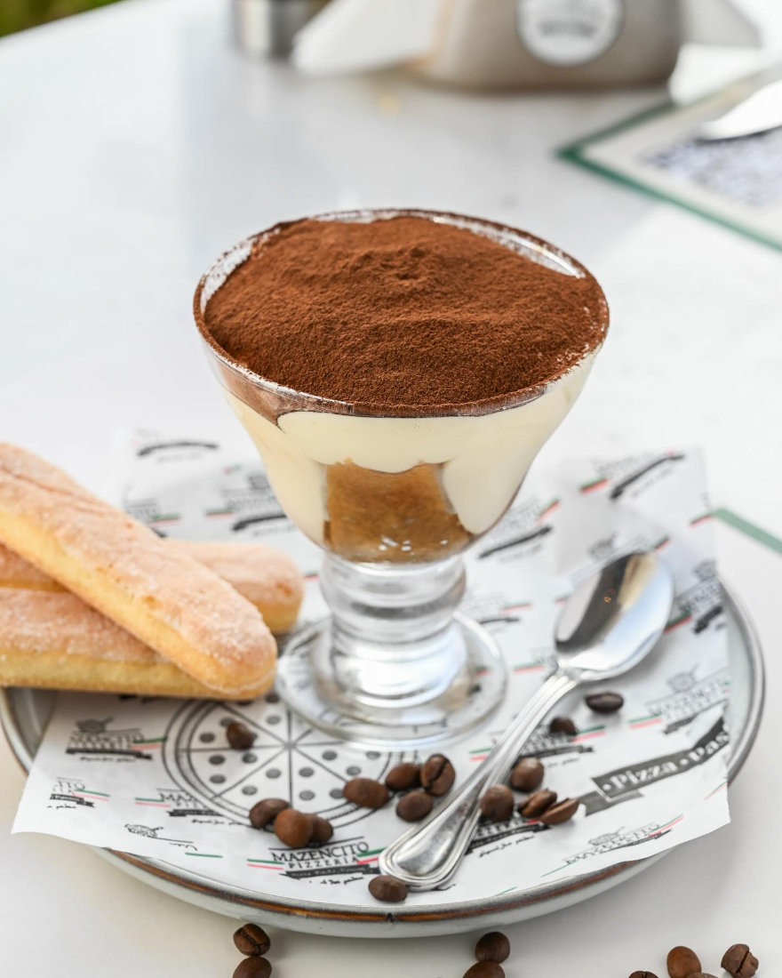 Tiramisù with ladyfingers and coffee beans at Mazencito Pizzeria
