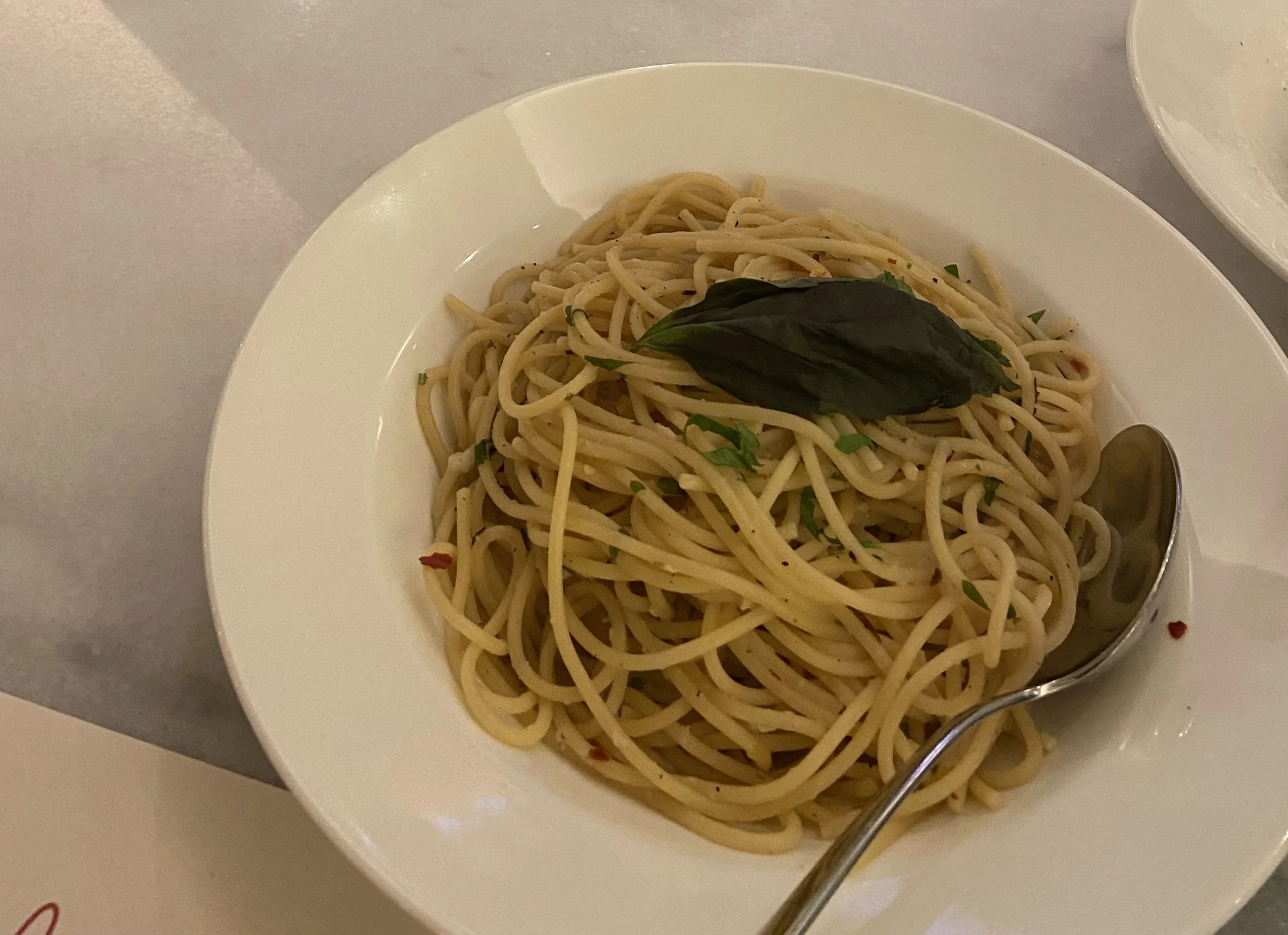 Spaghetti sautéed with garlic, chili flakes and olive oil